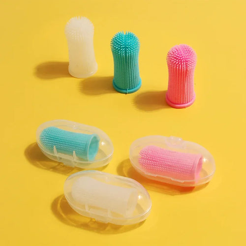 Brosse à dents doigt en silicone pour chien Câline & Co - portée au doigt